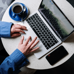 Coffee and computer on a table